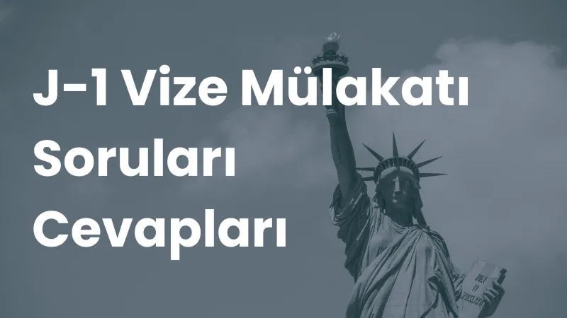 Bulutlu gökyüzü önünde Özgürlük Heykeli ve "J-1 Vize Mülakatı Soruları Cevapları" başlığı
