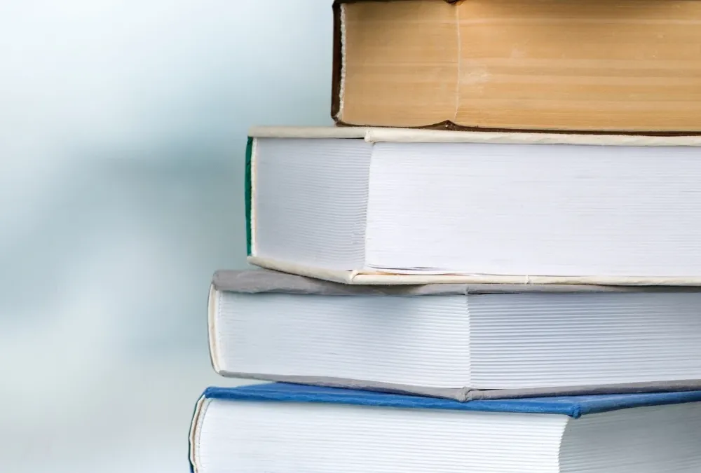 A stack of books, representing academic study in the US